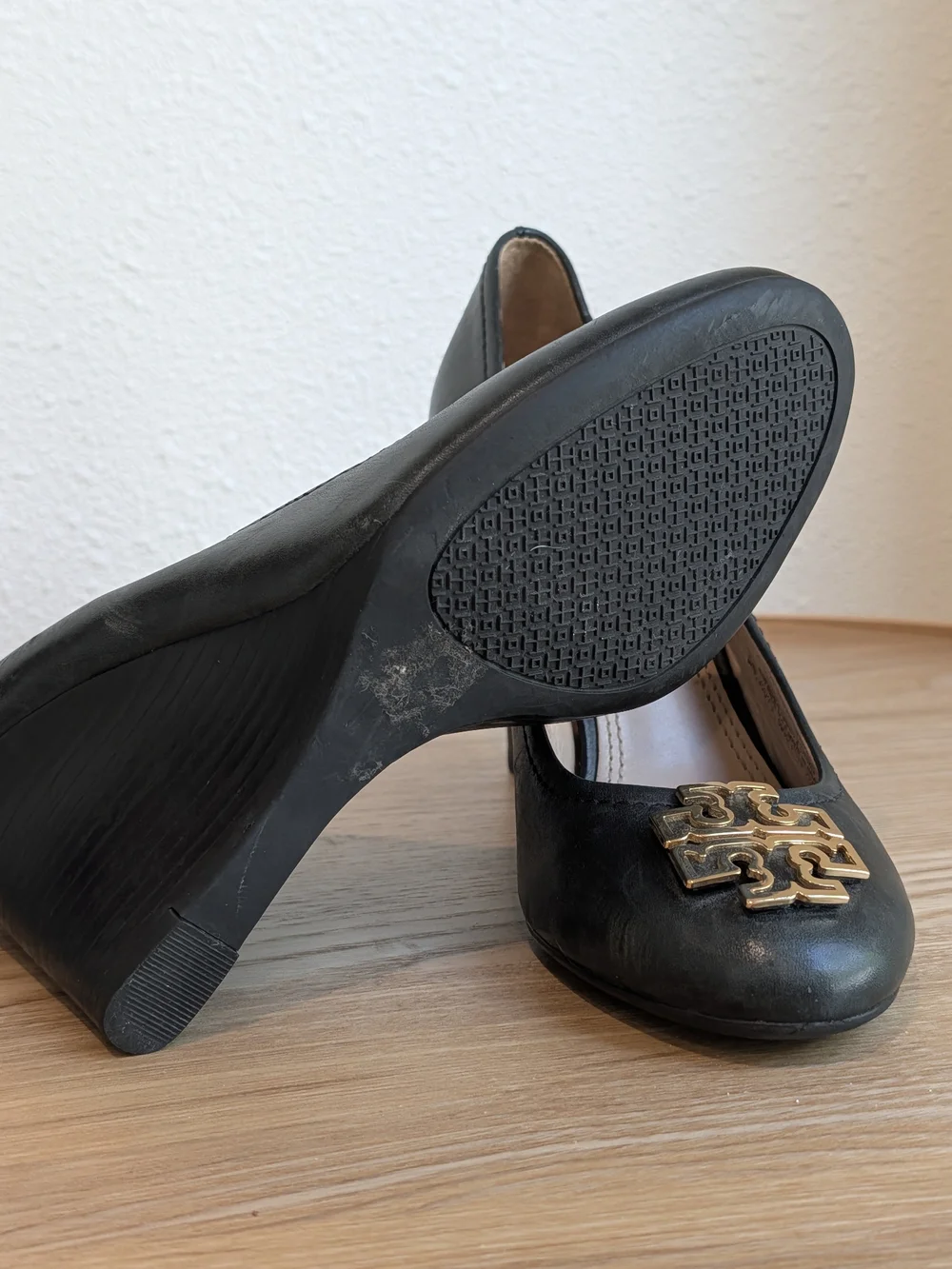 Tory Burch Black Leather Wedge Pumps with Gold Logo Accent